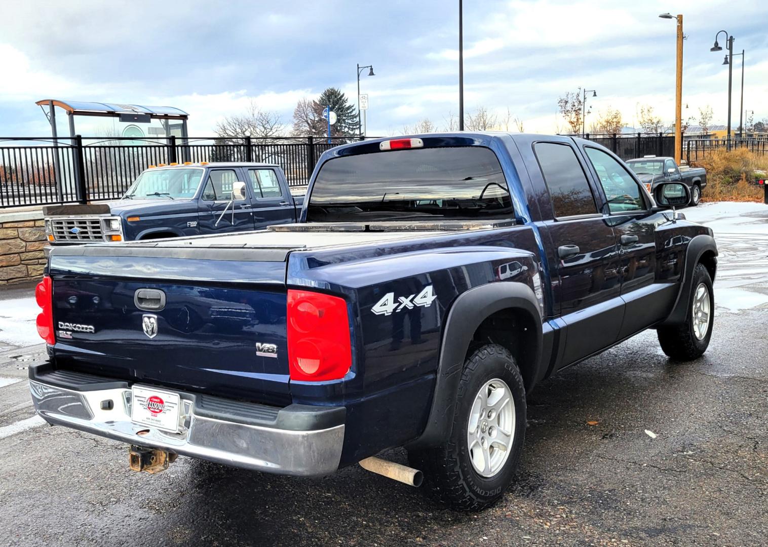 2006 Blue /Tan Dodge Dakota (1D7HW48N26S) with an 4.7L V8 engine, Automatic transmission, located at 450 N Russell, Missoula, MT, 59801, (406) 543-6600, 46.874496, -114.017433 - Great Running 4 Wheel Drive. Air. Cruise. Tilt. Power Windows and Locks. Power Drivers Seat. Newer Tires. Hard Cover over the Bed. - Photo#5